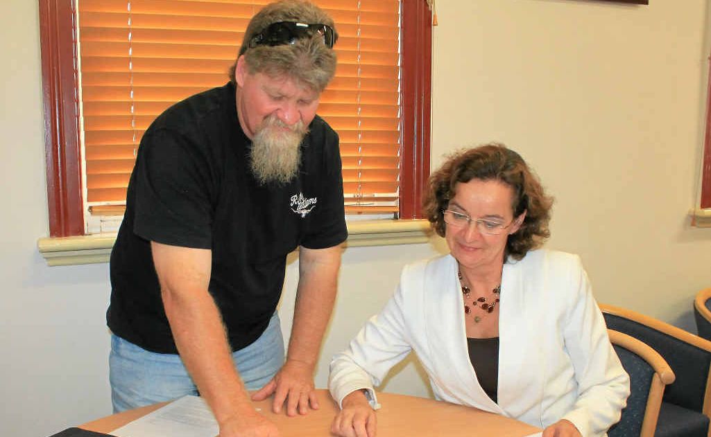 MASTERPLAN: Warwick State High School P&C; president Mark Wheeldon and principal Cheryl Dossetto look over the masterplan. MASTERPLAN: Warwick State High School P&C; president Mark Wheeldon and principal Cheryl Dossetto look over the masterplan.